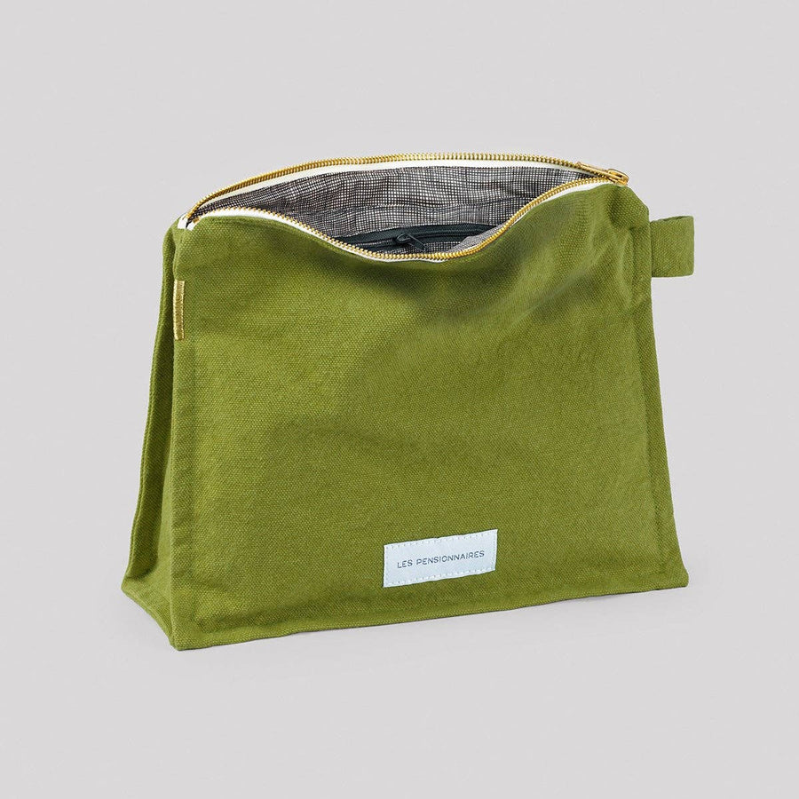 Moss green toiletry bag in thick organic cotton canvas.