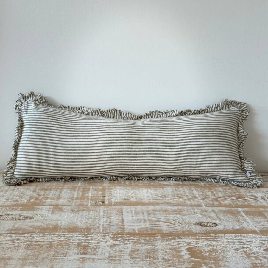 Striped pillow with frayed edges 