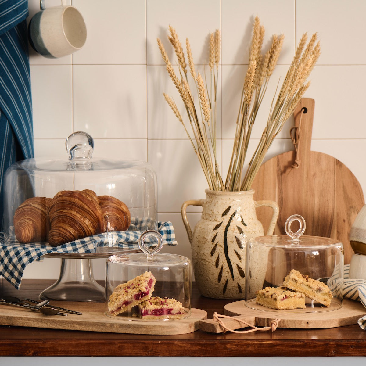 cutting-board-oval-w-handle-w-leather-string-acacia-wood-w-19-h-1-5-l-56