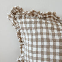 Thumbnail for Checkered linen cushion with ruffled edges on a neutral background