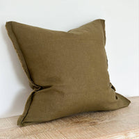 Thumbnail for Green Linen pillow on a wooden surface with a white background