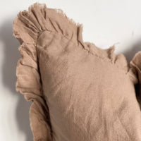 Thumbnail for Brown textured pillow with ruffled edges on a light background