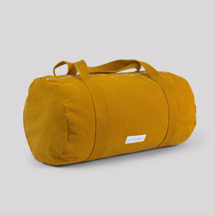 Mini bowling bag in saffron yellow organic cotton canvas