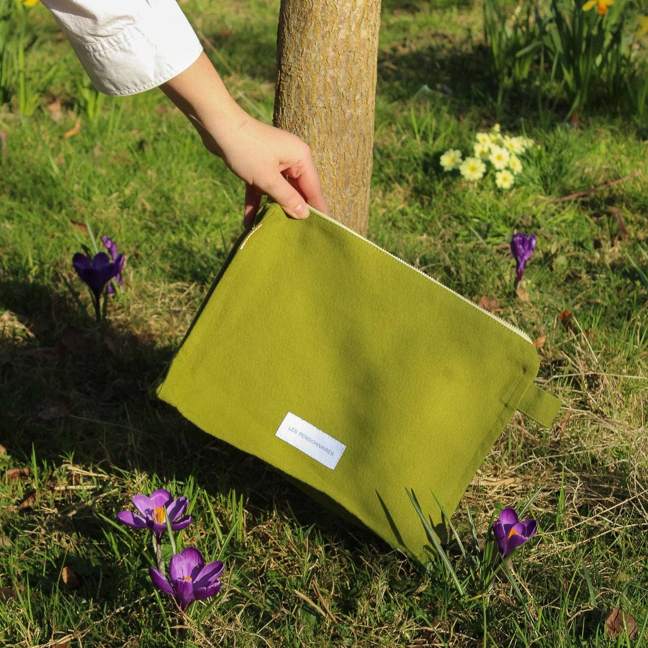 Moss green toiletry bag in thick organic cotton canvas.