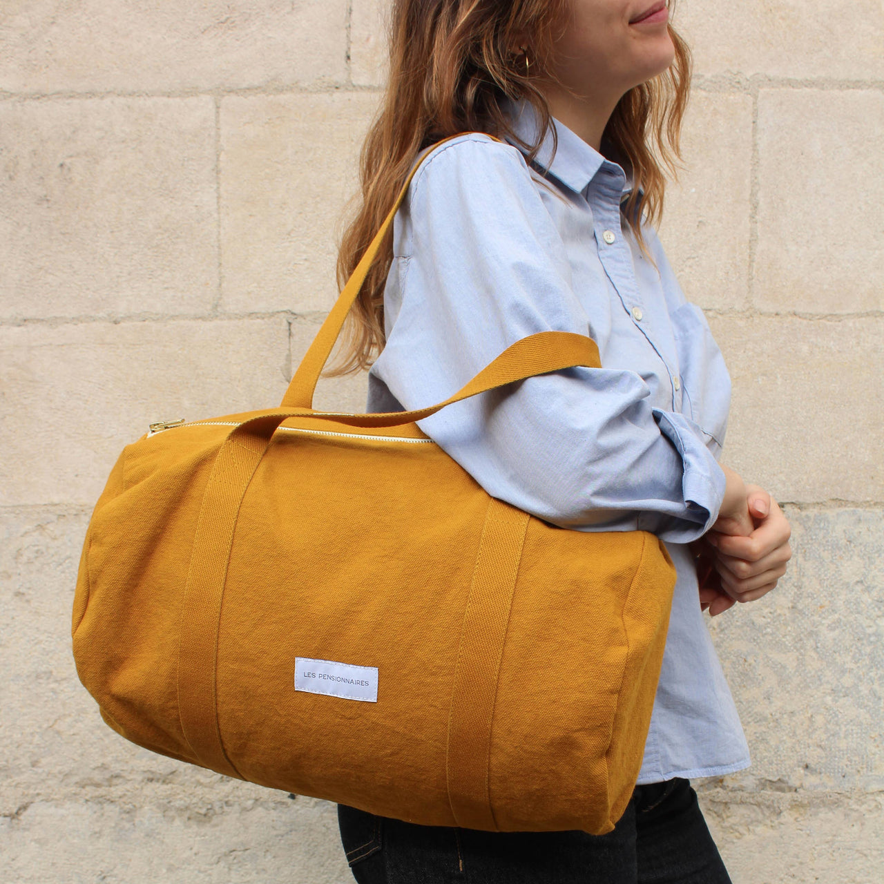 Mini bowling bag in saffron yellow organic cotton canvas
