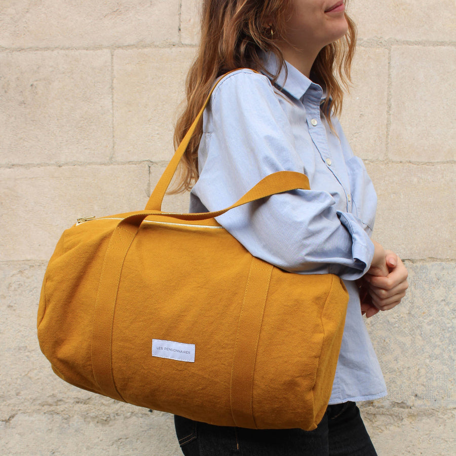 Mini bowling bag in saffron yellow organic cotton canvas