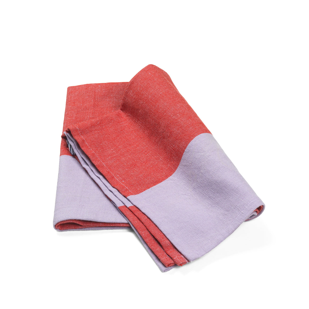 Folded red and purple tea towel on a white background
