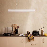Thumbnail for Beige kitchen with pendant light and various items on the counter