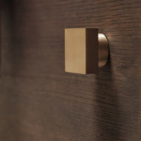 Thumbnail for Gold square door handle on a wooden door