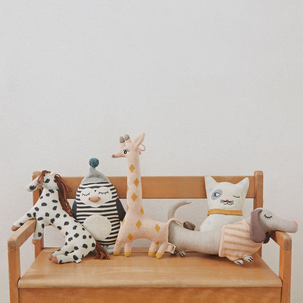 little darling cushions by oyoy living design cat, dog, giraffe , pony and penquin knitted cushions